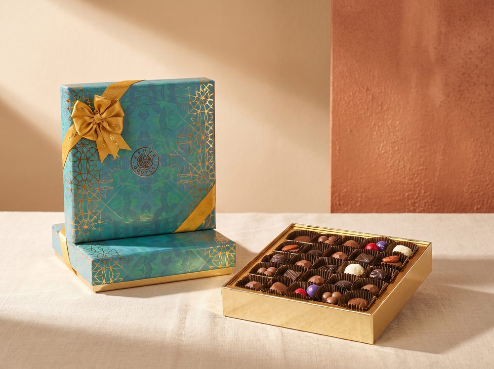Elite gift box open, twenty-five assorted chocolates in the gold tray